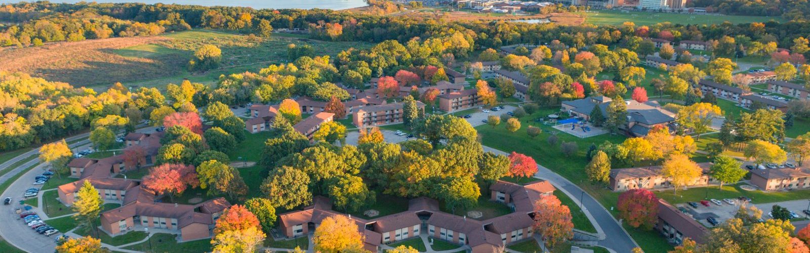 An aerial view of the Eagle Heights Neighborhood in University Apartments at sunset in fall