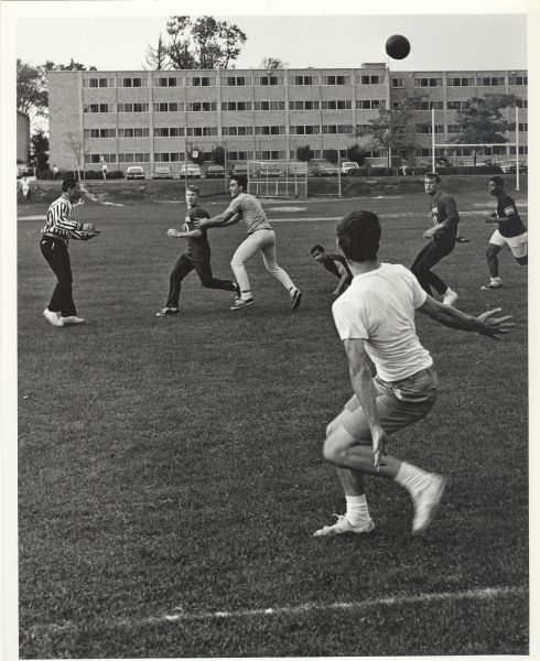 Students playing a game outside Bradley Hall