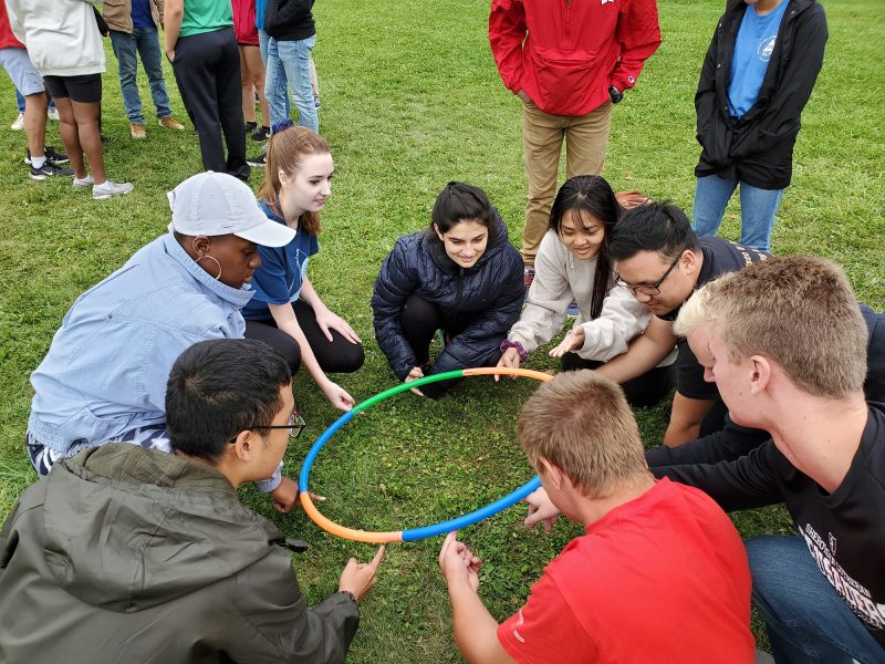 Residents of the Business Connect Learning Community participate in a ropes course