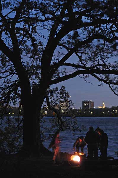 People enjoying a campfire at Picnic Point at night