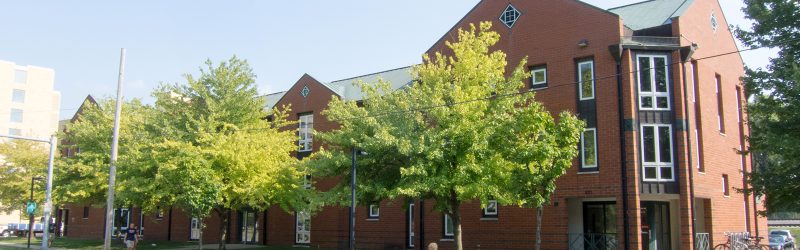 Merit Hall exterior in summer