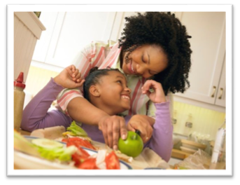 A mother and child bonding over healthy food in a kitchen