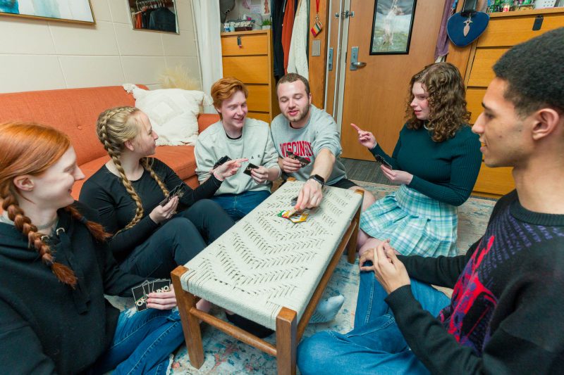 Winners of the 2023 Best Room Contest spend time with friends in their room in Cole Residence Hall