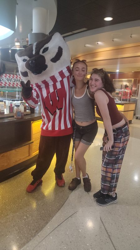 Badger Welcome Dinner - Bucky posing with residents
