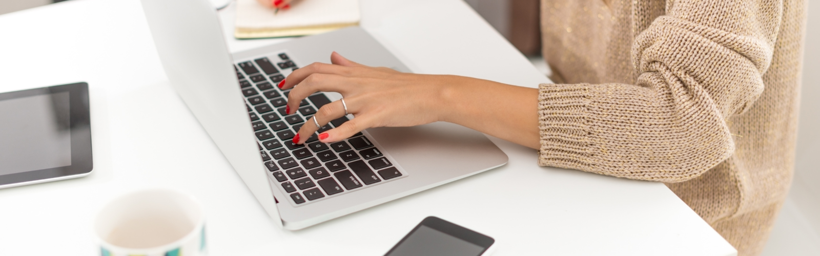 Women typing on computer